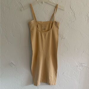 Tan Sleeveless under garment designed to tuck you in all the right places!